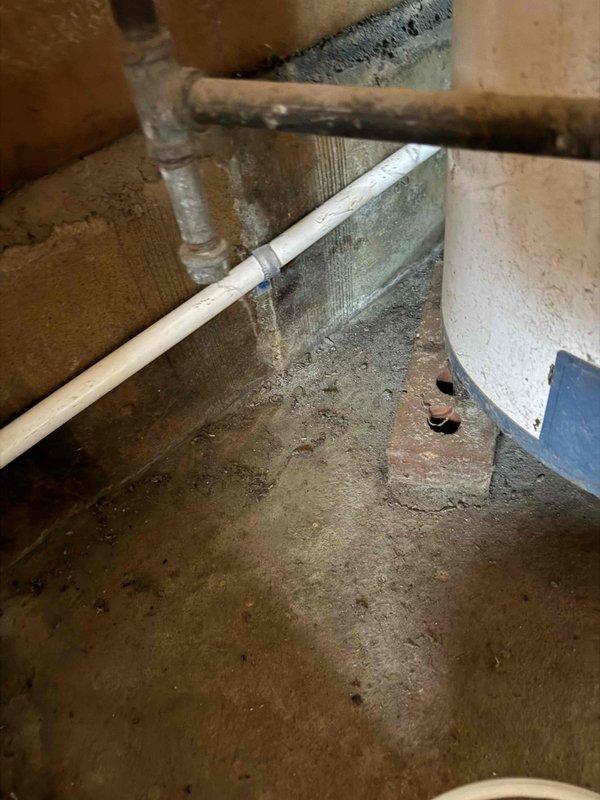 Responded to failed inspection due to undersized condensate drain line that was retaining water instead of allowing proper drainage flow. Corrected drain line sizing to meet code requirements and ensure proper water evacuation from the air handler unit, allowing for permit release and inspection approval.