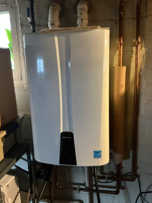 Responded to service call for a 7-year-old Navien natural gas tankless water heater requiring descaling maintenance and gas leak repair. The gas leak had been previously identified by an electrician during a prior visit to the property. Upon arrival, performed thorough inspection of the tankless water heater installation, including all gas supply connections, isolation valves, and piping assembly.

Conducted descaling procedure on the tankless unit to remove mineral buildup and restore optimal heat exchanger performance. Located and identified the gas leak at the connection points serving the tankless water heater. Performed pressure testing on the natural gas supply lines to verify leak location and ensure system integrity. Repaired the gas leak by tightening and resealing the affected brass fittings and connections. Applied leak detection solution to all gas connections to confirm complete seal and absence of additional leaks.

Re-tested the gas pressure throughout the system followi