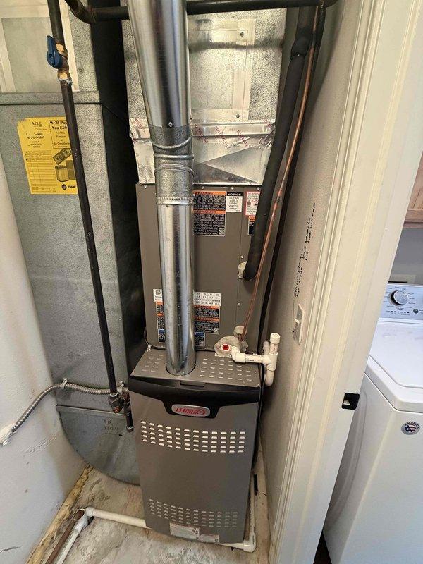 Completed installation of 80% efficiency Lennox furnace and air conditioning system. Installed new furnace unit in utility closet with proper ductwork connections and mounted condensing unit outdoors. Installed Littelfuse 30A dual fuse disconnect at exterior location, ran refrigerant lines between indoor and outdoor units, and completed all electrical connections. Configured condensate drain system with PVC piping and verified all manufacturer specifications and safety requirements were met. System tested and operational upon completion.
