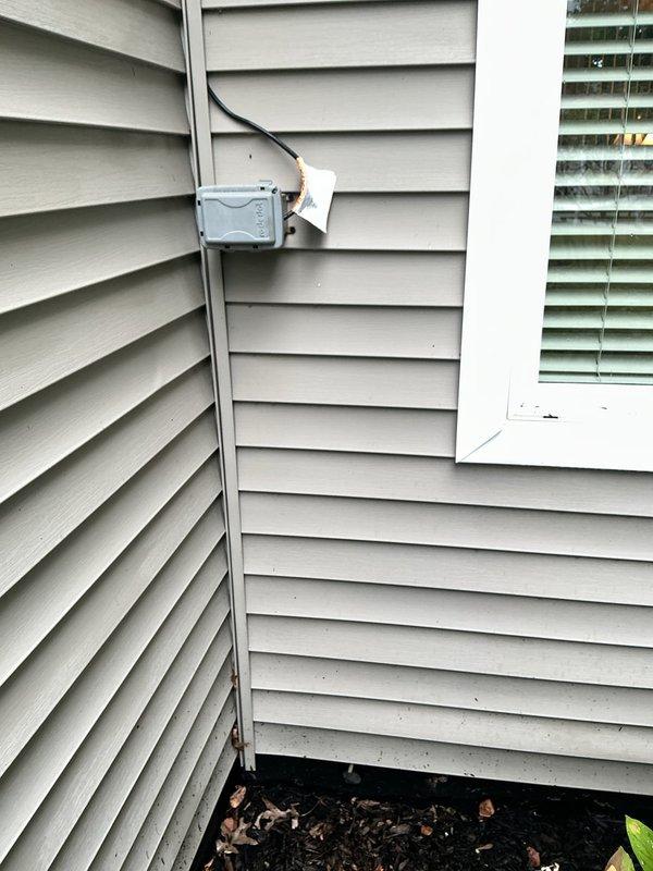 Replaced smoke detector on interior ceiling, ensuring proper mounting and functionality of new unit. Installed heat cables on exterior wall of TV room, routing conduit along building exterior and terminating in weatherproof junction box with appropriate cable connections for roof-mounted application.