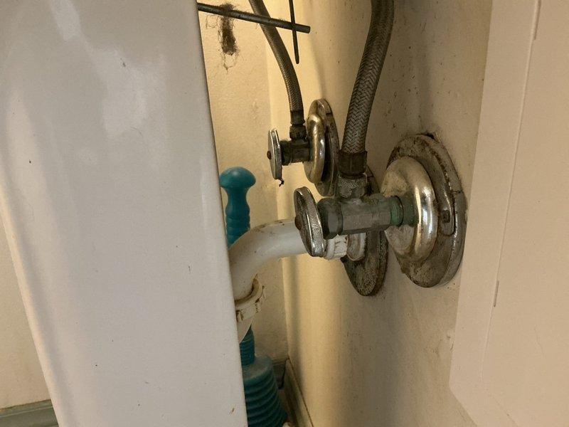 Replaced existing bathroom sink faucet with customer-provided chrome center-mount faucet featuring dual porcelain handles. Installed two new braided flexible supply lines to connect faucet to water supply. Replaced aging shut-off valves under sink with new chrome-plated angle stop valves to ensure proper water control and prevent future leaks. Tested all connections for leaks, verified hot and cold water flow, and confirmed proper operation of both handles and spout function.