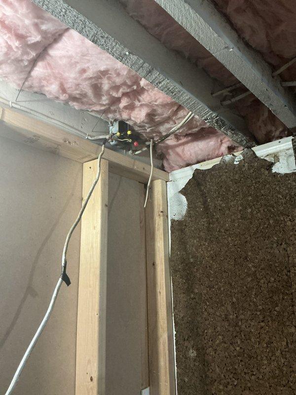 Responded to service call for electrical wiring installation into main breaker panel. Upon arrival, accessed existing electrical panel in basement utility area and successfully integrated new circuit by connecting beige electrical cable to appropriate breaker position. Routed wiring along wall and through ceiling joists in accordance with code requirements, ensuring proper support and protection of conductors. Verified all connections were secure, tested circuit functionality, and closed panel cover upon completion.