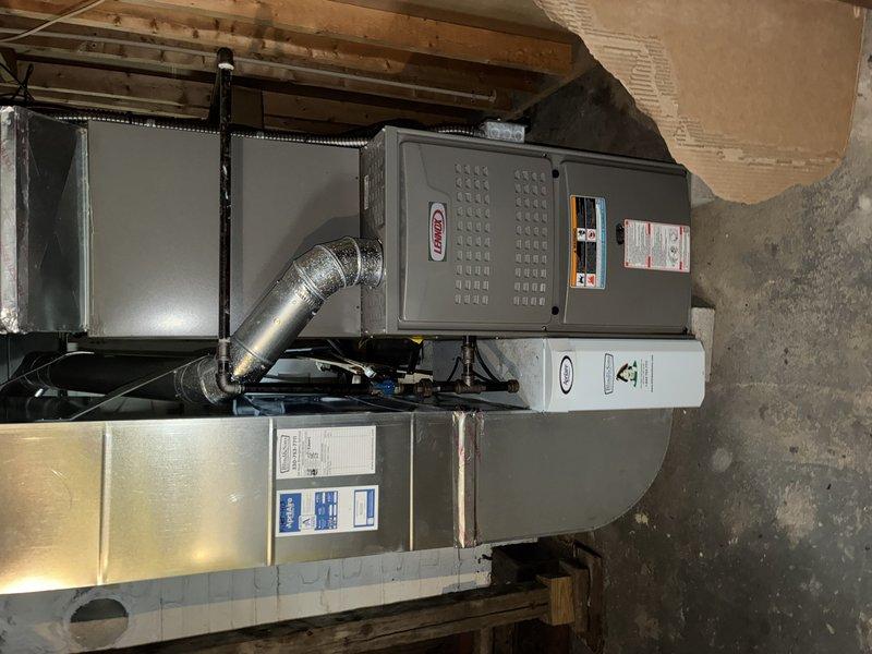 Completed MVP AC maintenance on residential cooling system. Inspected outdoor condenser unit, noting dirt and debris accumulation on evaporator coils which was cleaned to restore proper airflow and heat transfer efficiency. Performed visual inspection of indoor air handling equipment including furnace, air handler, and air filtration system, confirming all components are operating within normal parameters and connections are secure.