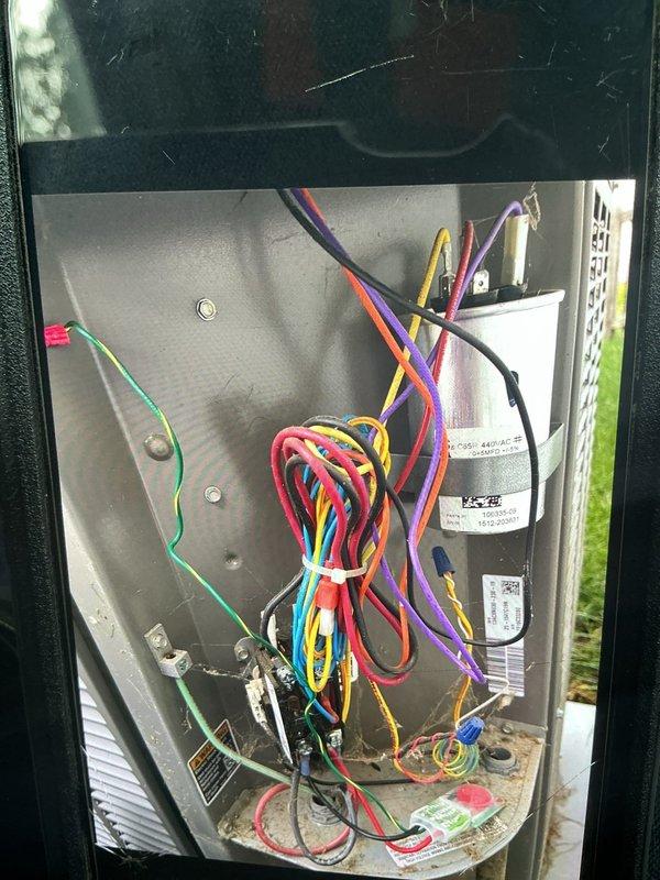 Completed routine cooling maintenance visit on 9-year-old air conditioning system. Inspected evaporator coil and found significant accumulation of dirt, dust, and debris on fins, though coil structure remained intact. Verified electrical components and capacitor connections within control panel, confirming all wiring and terminals secure and operational.
