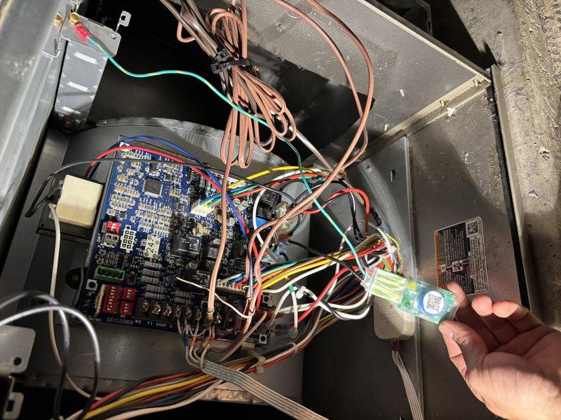 Installed surge protection device and replaced ECM blower motor in furnace system. Connected all necessary wiring harnesses to control board and motor, ensuring proper electrical protection and motor operation. System tested and confirmed operational upon completion.