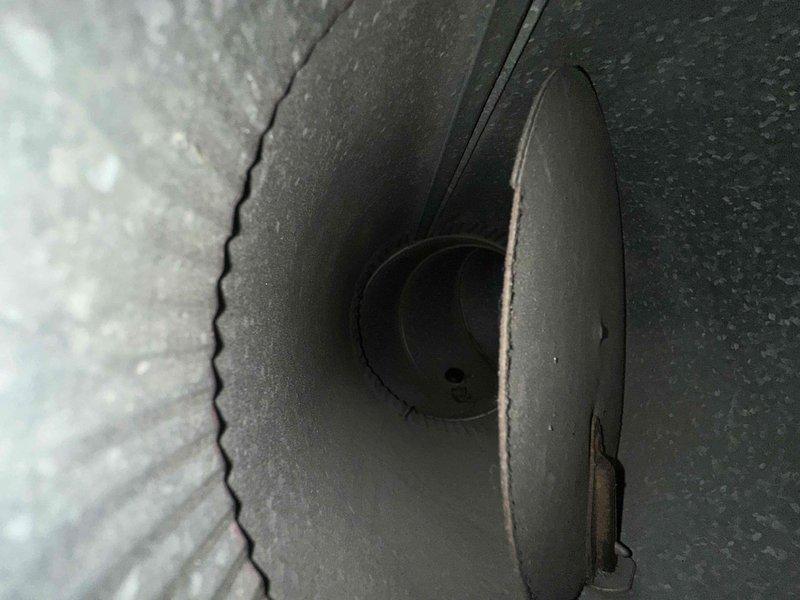Completed indoor air quality installation in crawl space area involving flexible ductwork assembly and connection points. Installed and secured metallic ribbed flexible duct with proper mounting flanges to existing HVAC distribution system, ensuring proper airflow to multiple vents throughout the structure. Work performed in under-floor crawl space with coordination for site access and confirmation upon arrival.