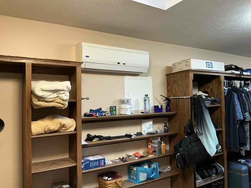 Conducted on-site evaluation for ductless mini-split system replacement in residential property. Assessed existing 13-year-old system with multiple indoor units including bedroom and closet locations. Recommended maintaining 12,000 BTU capacity unit for primary bedroom zone and provided comprehensive replacement quote for complete system upgrade.