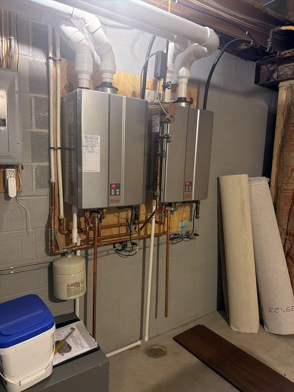 Completed routine maintenance flush on dual tankless water heater system in 9-year-old residential property. Descaled both units by circulating cleaning solution through heat exchangers via isolation valves, removing mineral buildup to restore optimal efficiency and prevent scale-related performance issues. Verified proper operation of both units, confirmed adequate venting through PVC exhaust system, and ensured all connections remained secure throughout the service procedure.