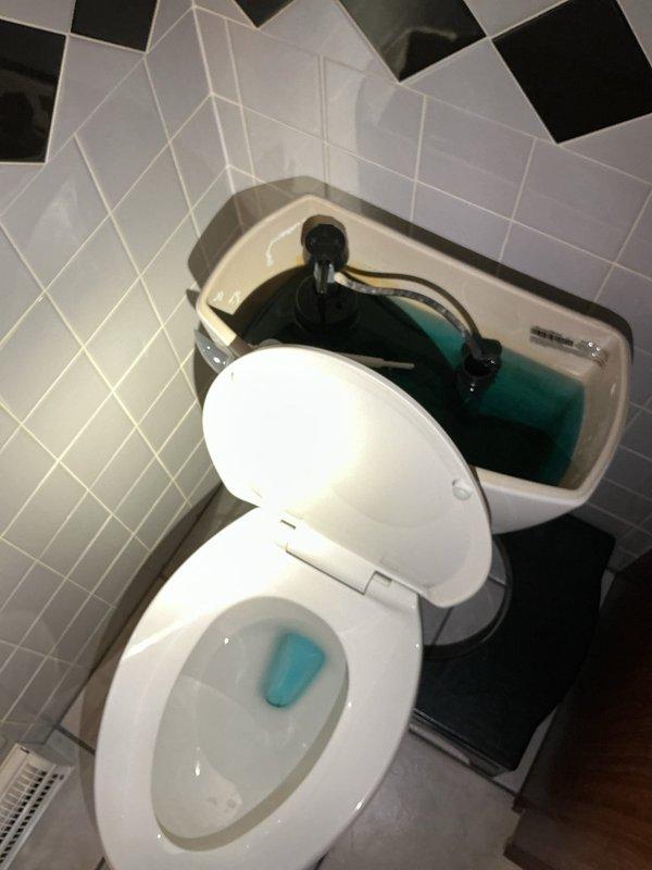 Responded to service call for toilet running intermittently with rusty-appearing tank water in 55-year-old residence. Upon arrival, inspected toilet tank and identified worn internal flush valve components causing phantom flushing and discolored water. Replaced complete toilet tank repair kit including flapper, fill valve, and flush valve assembly with modern water-efficient components. Adjusted water level and flush settings to manufacturer specifications. Tested flush cycle multiple times to ensure proper operation and verified no leaks at tank-to-bowl connection or supply line. Toilet now operates quietly without intermittent running, and water clarity has been restored.