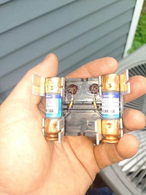 Completed installation of new air conditioning system with evaporator coil at residential property. Replaced dual 30-amp fuses/contactors on outdoor condensing unit and verified proper electrical connections. Indoor installation included integration with existing Lennox furnace system, established proper refrigerant line connections, and confirmed all condensate drainage lines were functioning correctly.
