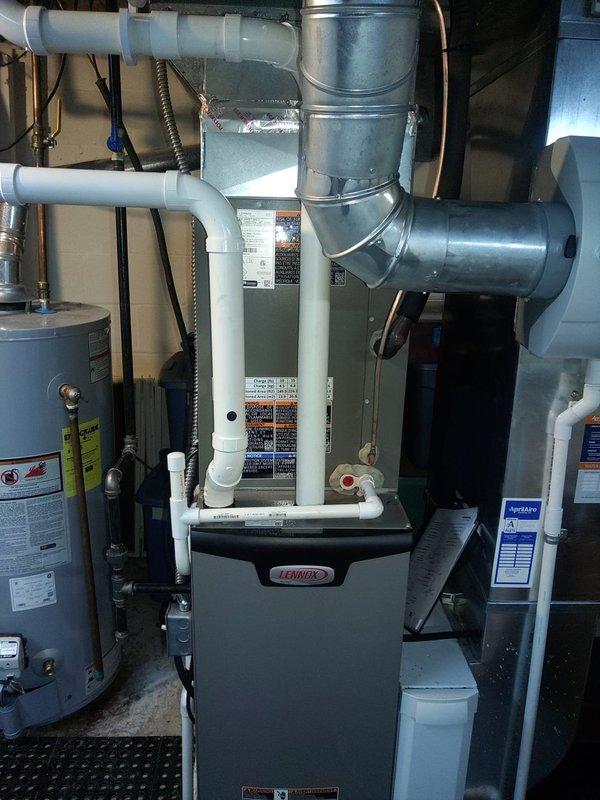 Completed installation of new air conditioning system with evaporator coil at residential property. Replaced dual 30-amp fuses/contactors on outdoor condensing unit and verified proper electrical connections. Indoor installation included integration with existing Lennox furnace system, established proper refrigerant line connections, and confirmed all condensate drainage lines were functioning correctly.