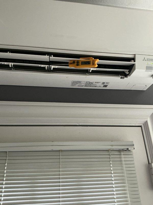 Responded to no cooling complaint on 3-year-old Mitsubishi Smart Multi mini split system serving bathroom area. Performed diagnostic testing on both indoor wall-mounted evaporator unit and outdoor condenser unit, utilizing digital testing equipment to measure system performance and identify root cause of cooling failure. Completed necessary repairs to restore proper cooling operation to the system.