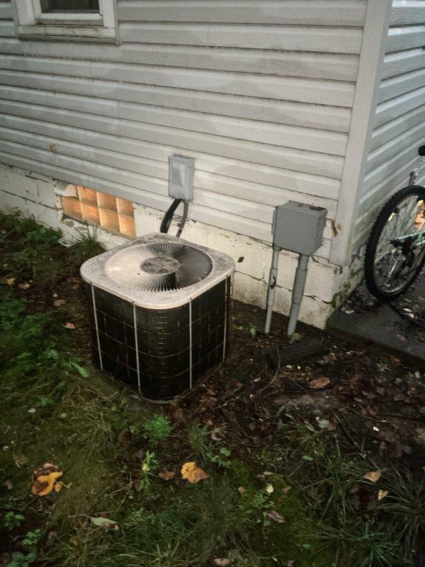 Completed full HVAC system installation including a 90% efficiency furnace in the basement mechanical room and matching air conditioning condenser unit on exterior pad. Installed new ductwork connections, condensate drainage piping, electrical disconnect, and refrigerant lines to provide complete heating and cooling solution for the residence.