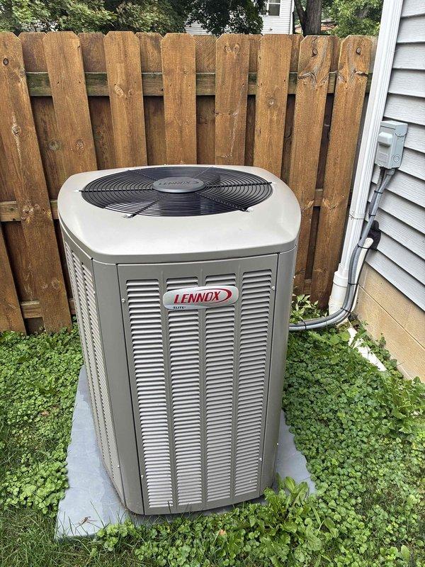 Completed MVP cooling maintenance visit on residential Lennox condenser unit. Performed standard preventive maintenance inspection of outdoor equipment, verified proper operation of fan assembly and ventilation louvers, and documented unit condition with photographic records. System found in good working order with clean exterior surfaces and proper installation on concrete pad foundation.