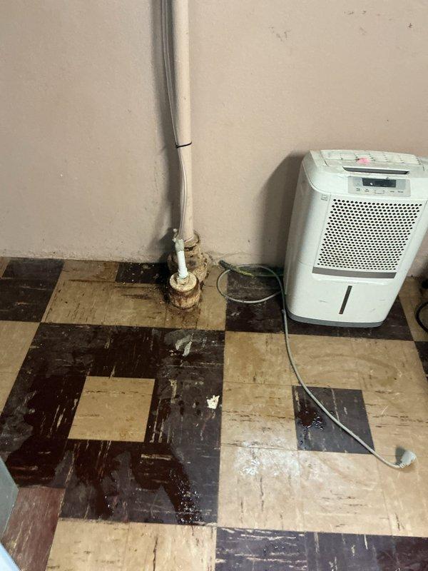 Responded to callback for recent HVAC installation to address three concerns: repaired refrigerant line leak at condensate box connection, leveled outdoor condensing unit, and evaluated thermostat mounting issues with customer requesting upgraded model and improved placement.