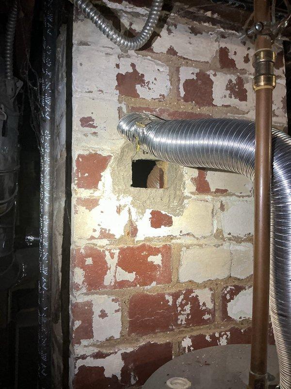 Responded to emergency service call for property with no hot water supply. Removed existing gas-fired tanked water heater and completed full conversion to electric tanked water heater system. Installation required reconfiguration of electrical supply lines, proper grounding, and connection to existing copper plumbing infrastructure. Verified all connections for leaks, tested unit operation, and restored hot water service to occupied residence within scheduled service window.