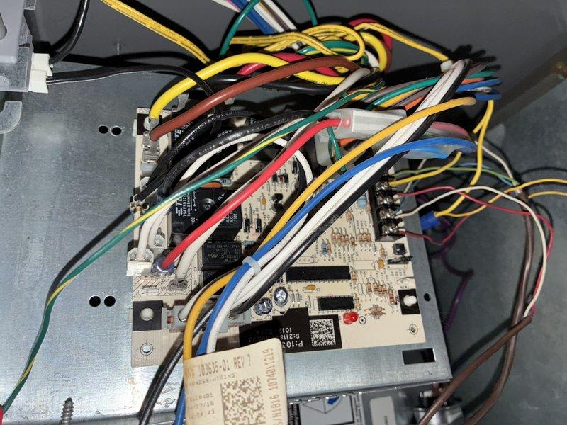 Completed seasonal tune-up on 8-year-old air conditioning system. Performed comprehensive inspection of control board assembly, verified all electrical connections and wiring harness integrity, and cleaned blower wheel assembly to ensure optimal airflow and system efficiency.