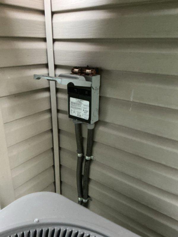 Completed preventive maintenance on 7-year-old outdoor air conditioning unit. Inspected electrical disconnect, condensate drainage system, and internal components; verified proper operation of condensate drain valve and drainage pan. Unit operating within normal parameters with no issues identified.