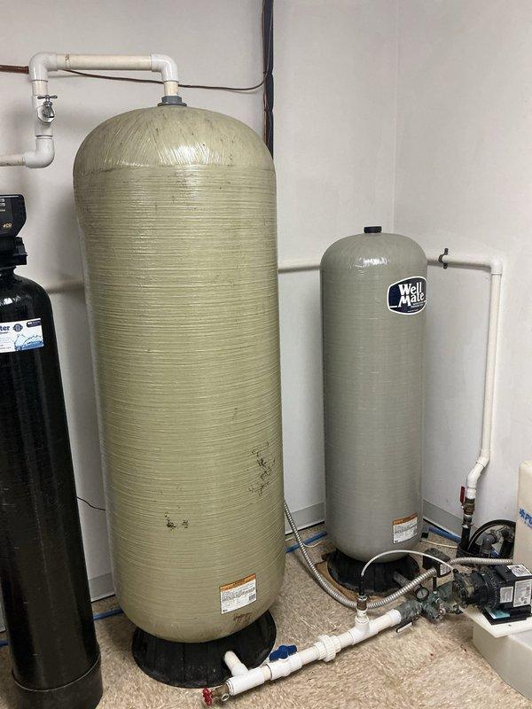 Conducted no-cost estimate for whole home UV water filtration system installation. Assessed existing water treatment infrastructure including water softener tanks, Well Matic pressure system, and ScaleBreaker chemical feeder to determine optimal integration points for UV filtration equipment. Documented current plumbing configuration and provided comprehensive quote for UV system implementation.