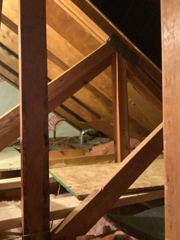 Conducted estimate for garage heater replacement. Assessed existing Lennox ceiling-mounted unit with associated ductwork, electrical connections, and attic infrastructure. Documented current system configuration including flexible ductwork routing through attic space, electrical wiring installation, and copper refrigerant lines with insulation. Photographed equipment location, mounting arrangement, and surrounding structural conditions to provide comprehensive replacement specifications.