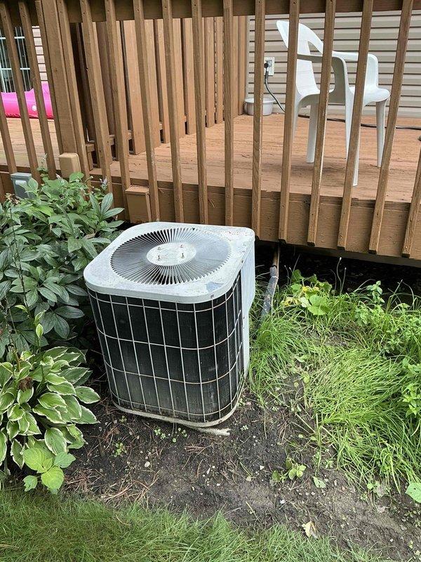 Conducted on-site assessment of existing air conditioning system for replacement estimate. Evaluated outdoor condenser unit located at grade level adjacent to deck structure, noting older equipment with operational issues requiring full system replacement. Inspected indoor components including ductwork distribution system in mechanical room with sheet metal trunk lines and branch connections to existing electrical service panel. Documented current equipment configuration, electrical connections, and ductwork layout to provide comprehensive replacement specifications for new HVAC system installation.