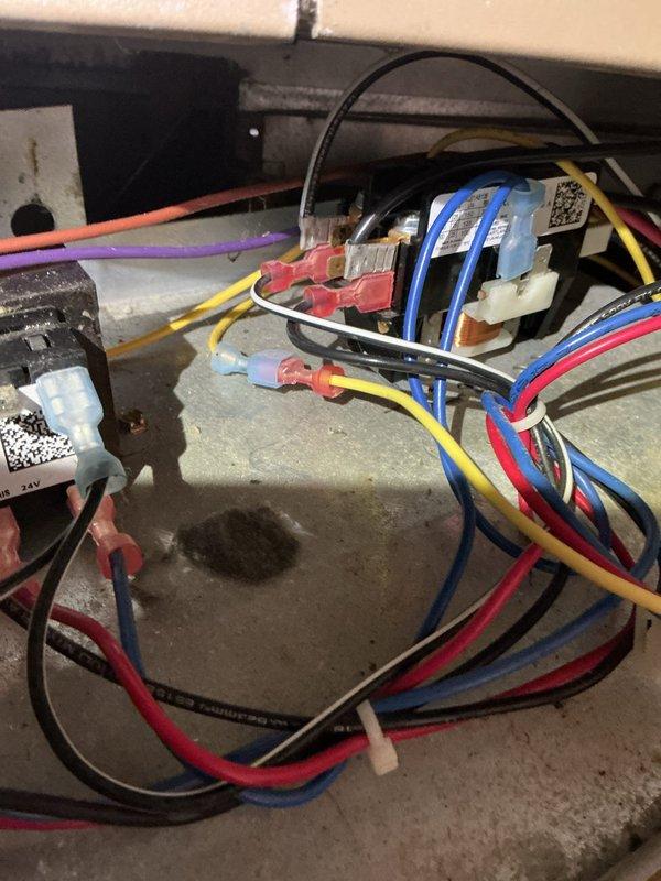 Replaced failed blower motor, capacitor, and circuit board on outdoor HVAC unit located in exterior closet. The original blower motor exhibited severe corrosion on terminal connections and housing, indicating moisture exposure and component failure. Removed deteriorated motor assembly and installed new blower motor with proper electrical connections. Replaced failed capacitor and circuit board to restore system functionality. Work was coordinated for dry weather conditions to protect exposed components during repair. All electrical connections were secured and tested for proper operation upon completion.
