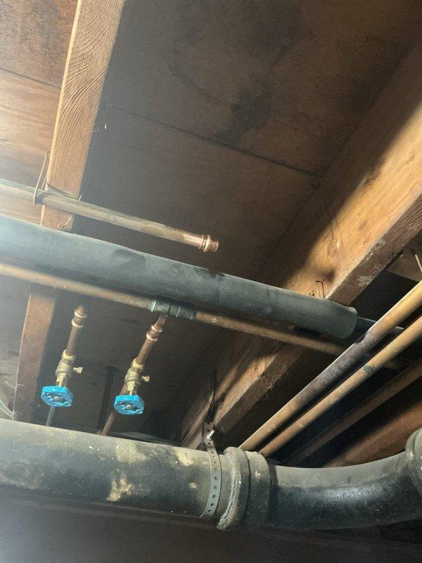 Replaced a failed 2018 A.O. Smith 50-gallon gas water heater with a new Bradford White 50-gallon gas unit featuring an 8-year manufacturer warranty. Installed a new thermal expansion tank to replace the existing unit and properly disconnected and capped the recirculating line approximately 12 inches below the ball valve. All copper supply lines were connected to the new water heater, and the gas line and flue vent were properly configured to ensure safe operation of the new system.