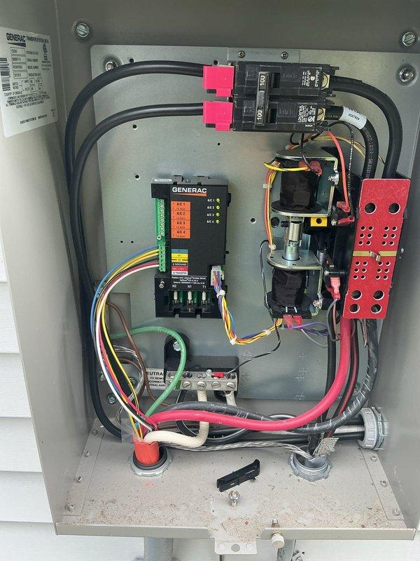 Responded to service call for Generac Evolution 2.0 generator that would not shut off over the weekend and had to be manually unplugged by homeowner. Upon arrival, inspected generator control panel displaying firmware/hardware version V1.6 and verified all control buttons (AUTO, MANUAL, OFF) for proper operation. Examined automatic transfer switch assembly, including Generac control module with status indicators, circuit breakers, contactors, and associated wiring connections. Tested system functionality, verified proper shutdown sequence, and confirmed generator now responds correctly to OFF command and operates normally through all control modes.