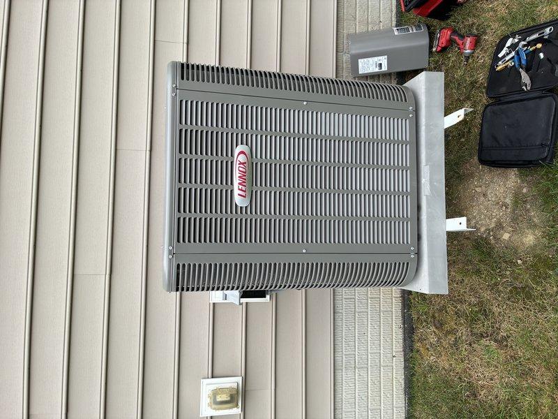 Completed BS-MVP recurring cooling maintenance visit on 3-year-old Lennox air conditioning system. Performed comprehensive inspection of outdoor condenser unit and indoor air handler components. Checked electrical connections, control boards, and wiring throughout system - all found secure and properly routed. Inspected condensate drainage system and verified proper operation. Evaluated refrigerant lines and electrical disconnect. Unit operating within normal parameters with no deficiencies noted. System confirmed ready for continued cooling season operation.