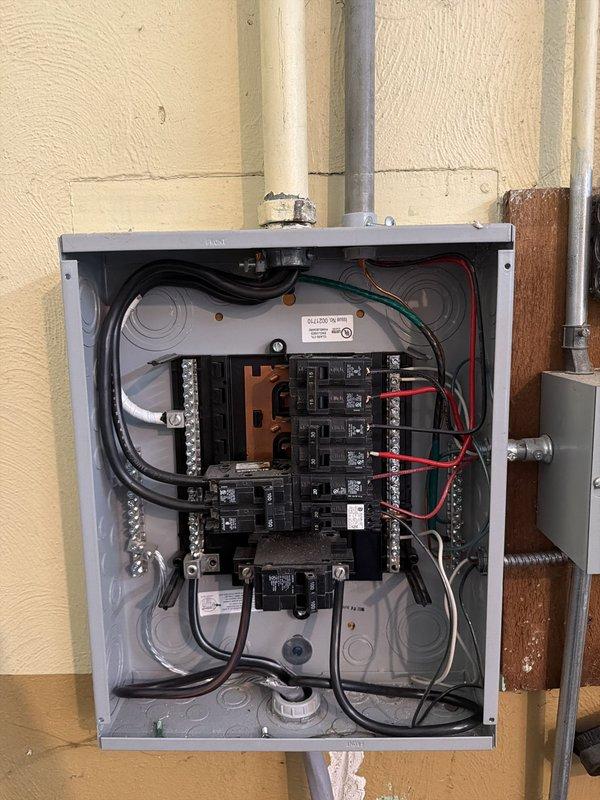 Completed installation of 18KW standby generator with 100-amp automatic transfer switch, whole-house surge protector, and oil warmer system. Ran 45 feet of electrical line from main service panel to generator location and 30 feet of natural gas supply line to fuel the unit. Installed and wired transfer switch to integrate generator with existing electrical system, ensuring seamless power transfer during outages. Mounted surge protection device to safeguard home electronics and appliances. Connected oil warmer to generator to facilitate cold-weather starting. All electrical connections made to code with proper grounding and bonding. Gas line pressure tested and verified for safe operation. Programmed transfer switch for automatic operation and tested system functionality through simulated power outage. Unit successfully started and ran through load test, confirming proper operation of all circuits. Provided operational overview of generator controls, maintenance requirements, and transf