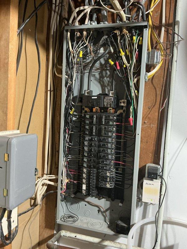 Responded to service call for non-functioning outdoor lighting system. Upon inspection, identified outdated timer mechanism as primary cause of failure. Troubleshot electrical panel connections, verified circuit breaker functionality, and tested lighting circuits throughout the property. Replaced obsolete timer control with updated equipment, restored power to outdoor lighting system, and confirmed all fixtures operational. Inspected interior chandelier fixture during walkthrough to ensure overall electrical system integrity.