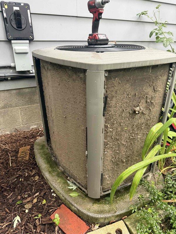 Completed preventative maintenance tune-up on residential outdoor AC condenser unit. Upon arrival, found heavily soiled condenser coils with thick accumulation of dirt, dust, and debris restricting airflow, along with significant exterior cabinet contamination. Cleaned condenser coils, removed debris buildup, and inspected all accessible components to restore unit to proper operating condition.