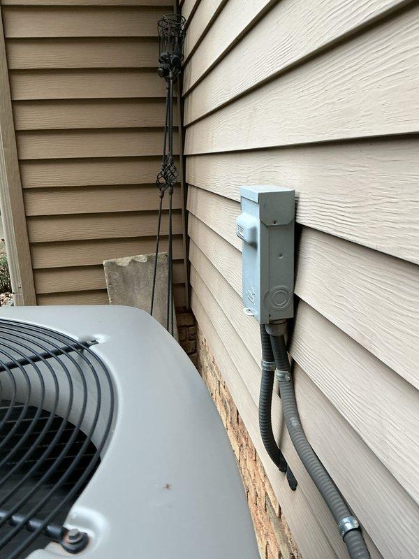 # HVAC Maintenance - Cooling

Completed comprehensive MVP cooling maintenance visit on 8-year-old Lennox air conditioning system. Performed standard seasonal inspection of outdoor condenser unit, including visual assessment of cabinet condition, louver vents, and fan assembly. Verified proper unit placement on concrete pad with adequate clearance from surrounding landscaping and building structure. Inspected electrical disconnect box, flexible conduit connections, and wiring routing along exterior wall. Confirmed PVC condensate lines are properly installed and secured. Unit operating within normal parameters with no immediate service concerns identified. All components show appropriate wear for equipment age. Documented system condition with photographic records for maintenance history.