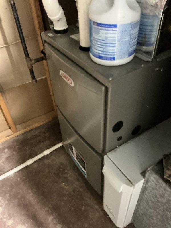 Completed scheduled MVP cooling maintenance visit on 3-year-old HVAC system. Performed comprehensive inspection of furnace unit in basement utility area, verified proper operation of all components, and checked electrical disconnect box and exterior connections. System found to be in good working condition with normal wear consistent with age.