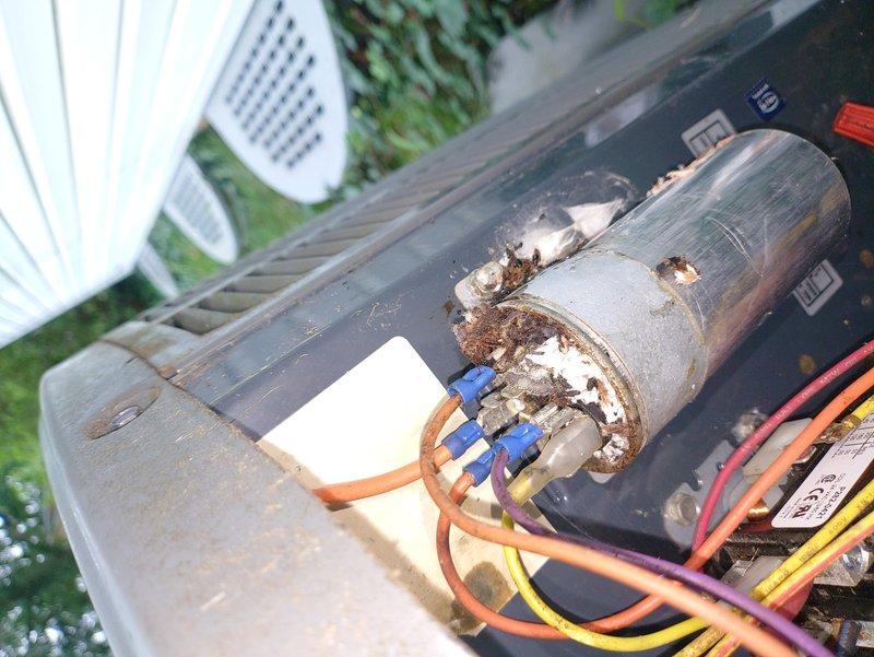 # HVAC Maintenance - Cooling

Completed preventive maintenance cooling visit on 2-year-old residential HVAC system. Inspected outdoor condensing unit and indoor air handler components, documenting equipment condition with photographs. Outdoor unit showed visible corrosion and rust accumulation on capacitor housing and mounting hardware, with weathered electrical connections requiring monitoring for future service needs. Verified all electrical wiring connections, checked refrigerant lines, and confirmed proper operation of both indoor furnace/air handler assembly and outdoor condensing unit. System operational at time of departure.