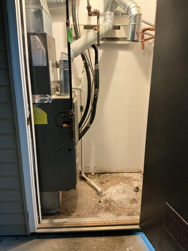 Performed hot water heater removal from mechanical room as requested by customer. Unit was disconnected from copper supply lines, drain valve, and gas line, then carefully extracted from confined utility space adjacent to HVAC equipment and ductwork. Second appointment scheduled for reinstallation of the water heater once customer's preparations are complete.