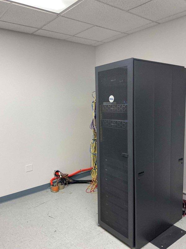 Conducted electrical site assessment for backup generator installation to support dedicated IT server room. Evaluated existing infrastructure including server rack cabinet with Dell equipment and associated network cabling. Documented current electrical configuration and space requirements to develop comprehensive generator specification for emergency power supply to critical data systems.