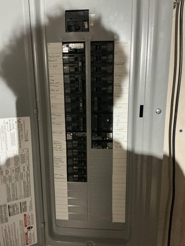 Completed electrical service for pool heater installation requiring proper circuit protection. Identified that a 50A breaker was initially installed for a 20A pool heater, necessitating replacement with the correct 20A GFCI breaker to meet code requirements and manufacturer specifications. Wired pool heater from disconnect to panel with appropriate gauge conductors and installed proper GFCI circuit protection. Trench backfilling scheduled for completion upon return visit.