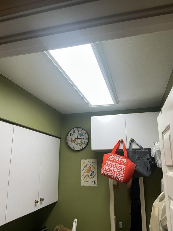 Completed replacement of two light fixtures, one above kitchen sink and one in half bathroom. Installed rocker-style switches throughout residence, including dimmer switch in dining room and dual switches in half bath. Ran 100 feet of new wiring along front walkway for landscape lighting installation.