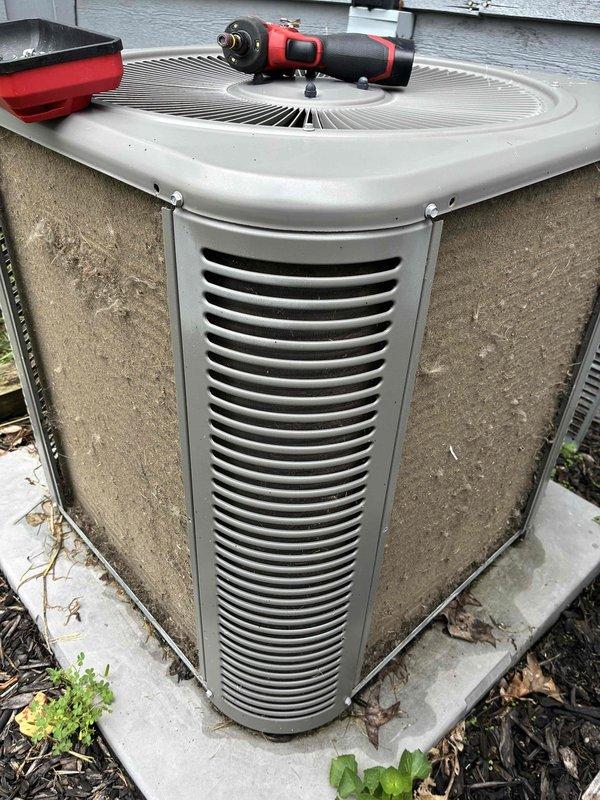 Completed comprehensive AC tune-up on 6-year-old outdoor condensing unit. Performed standard maintenance protocol including inspection of condenser coils, fan assembly, and electrical components; unit operational with normal airflow and no issues identified. Cleaned debris from base area and verified proper operation of all systems.