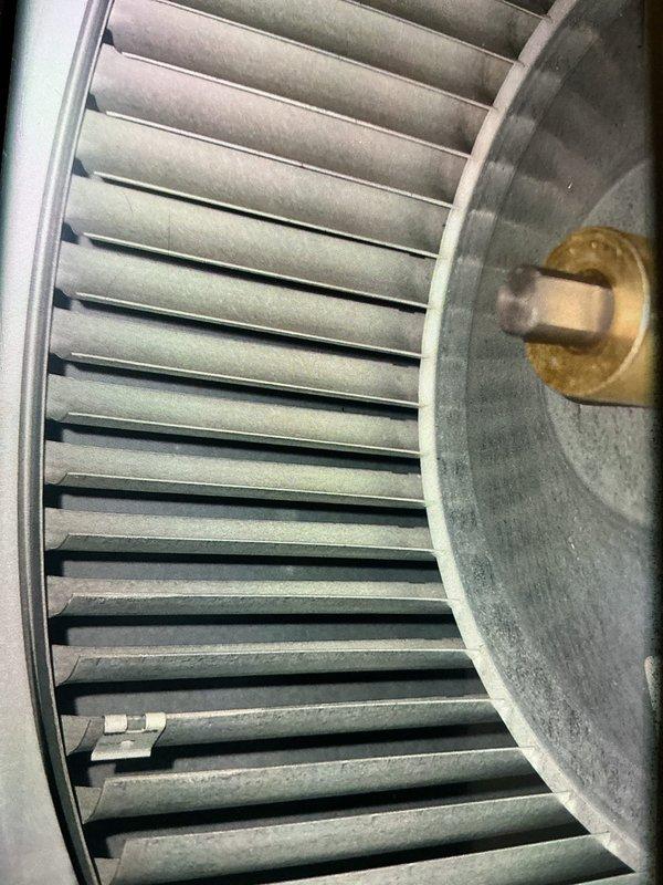 Completed MVP cooling maintenance visit on two HVAC systems. Inspected blower wheel assembly and identified significant dust and debris accumulation on blower cage blades and housing, which can restrict airflow and reduce system efficiency. Documented equipment condition through photos for maintenance records.