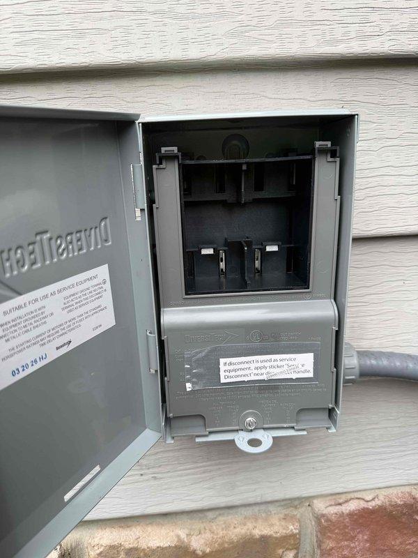 Installed soft start kit on HVAC system requiring upgraded electrical service. Replaced existing disconnect box with new 60-amp disconnect and dual-element time-delay fuses rated at 40A/250V AC to accommodate equipment specifications and ensure proper circuit protection.