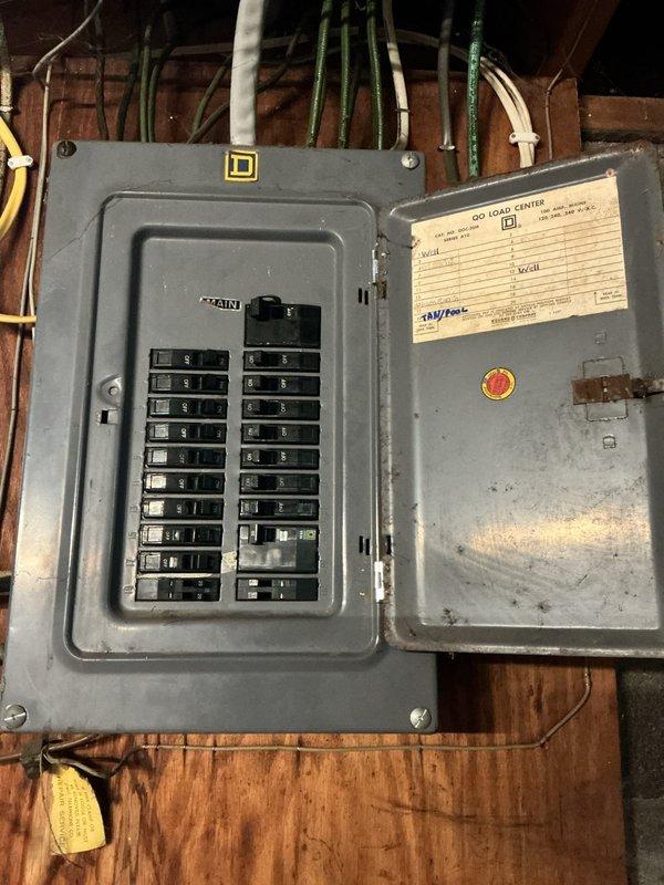 Installed dedicated electrical circuit for septic system in accordance with job specifications. Mounted new electrical panel on plywood backing against concrete block wall in basement utility area, completing all necessary wiring connections with proper conduit routing through exposed ceiling joists to ensure code-compliant power supply for septic equipment operation.