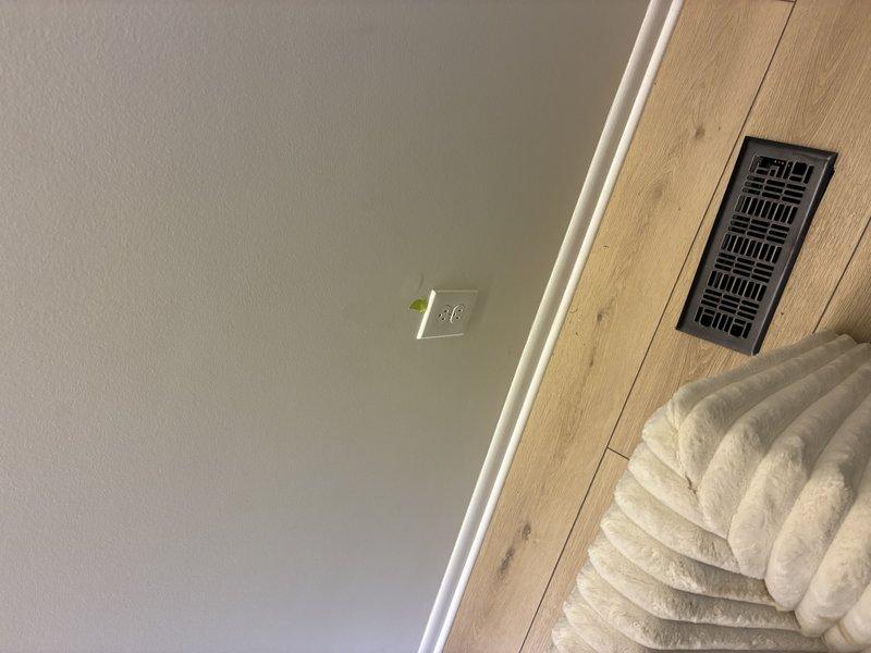 Responded to service call for multiple electrical issues in residential property preparing for sale. Troubleshot and restored power to three non-functioning outlets and sunroom circuit by identifying tripped breaker and loose neutral connection at panel. Rewired seven light switches throughout home to correct code violations and improper wiring configurations discovered during inspection. Inspected external electrical box serving hot tub installation and replaced faulty GFCI breaker that was failing to provide proper ground fault protection. Verified all circuits operational, tested GFCI functionality, and confirmed proper grounding throughout affected areas. All work completed to current NEC standards.