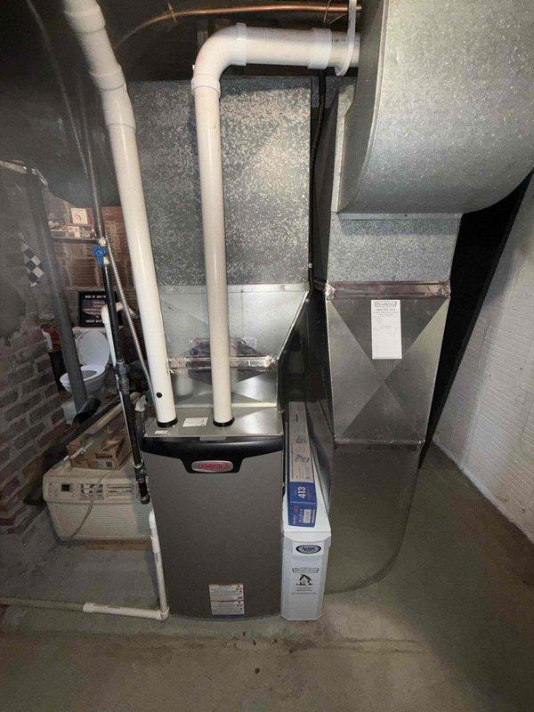 Completed scheduled MVP cooling maintenance visit on residential HVAC system. Performed comprehensive inspection of furnace unit, ductwork connections, and control board components including DIP switch configurations and circuit board connections. All system components operating within normal parameters, documentation photos captured for service records.