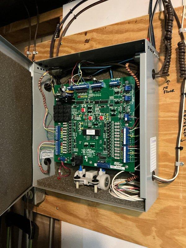 Returned to site to replace defective transformer on the zone control board. Removed existing panel cover, disconnected faulty transformer, and installed new replacement unit. Verified all wire connections to terminal blocks, tested board functionality with LED indicators, confirmed proper operation of all zones, and secured panel enclosure.
