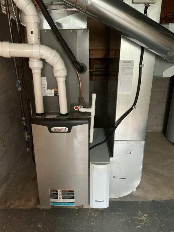 Completed MVP cooling maintenance visit on residential Lennox HVAC system. Performed standard preventive maintenance procedures on outdoor condensing unit including coil washing as requested. Inspected indoor furnace unit and associated components in basement mechanical room. System operational and functioning within normal parameters upon completion of service visit.