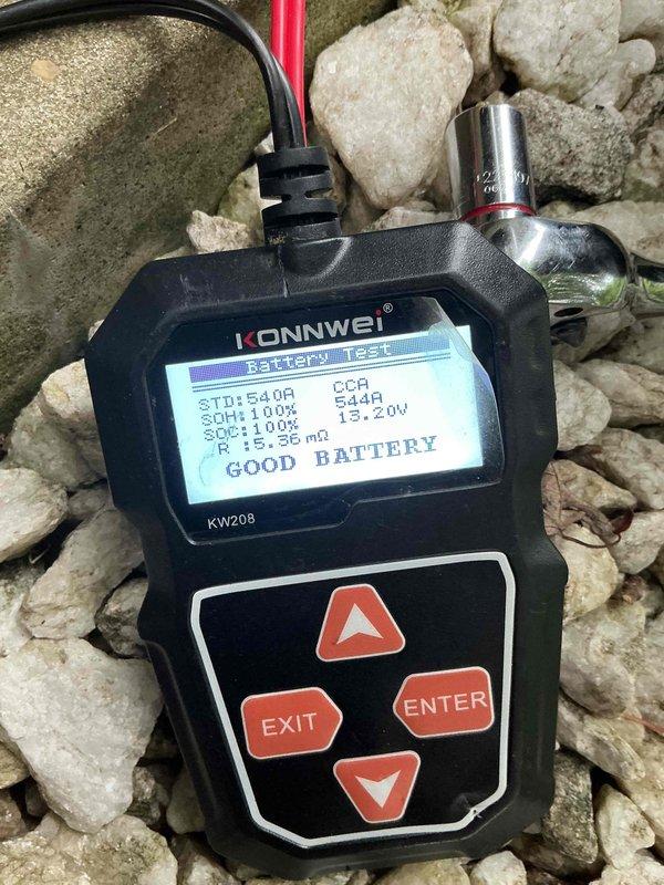 Performed annual preventive maintenance on 20kW residential standby generator unit. Conducted comprehensive battery load test using diagnostic equipment, confirming battery health at 100% capacity with proper voltage output of 34.2V and acceptable internal resistance of 15.36 mΩ. Verified all electrical connections, inspected gas line and conduit installations along exterior wall, and confirmed generator control panel operation with green indicator light showing system ready status.