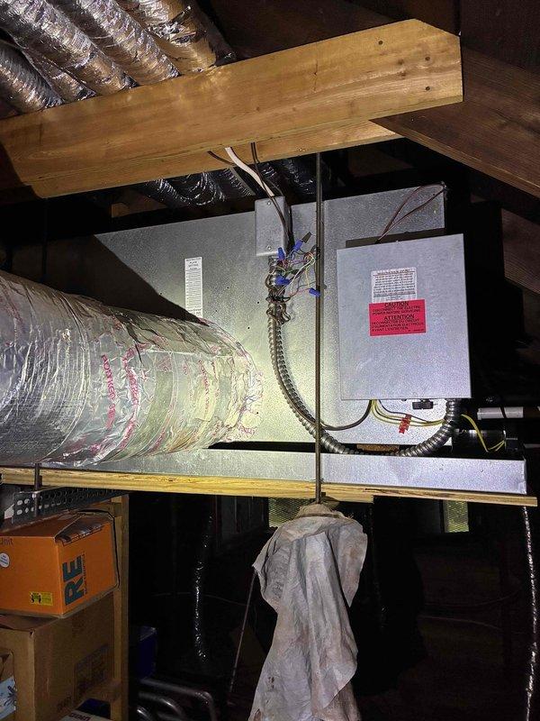 Completed yearly air conditioning maintenance on attic-mounted air handler unit. Performed comprehensive system inspection, checked electrical connections and controls, examined ductwork connections, and verified proper operation of all components. Unit found to be in satisfactory working condition with no immediate repairs required.