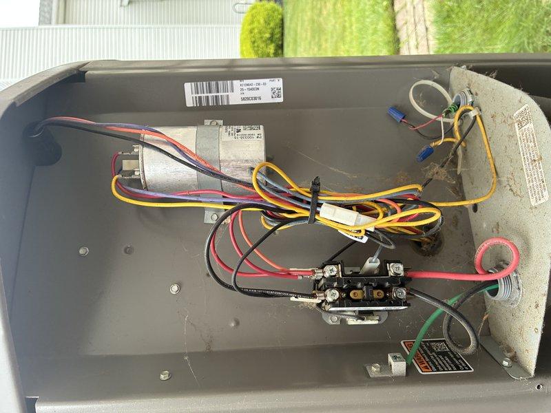 Completed scheduled maintenance visit on 6-year-old air conditioning system for MVP customer. Performed electrical diagnostics using clamp meter to verify system amperage and confirmed proper current draw. Inspected contactor, capacitor, and electrical connections within condensing unit control panel, finding all components properly secured with appropriate wire management and terminal connections intact. System operating within normal parameters.